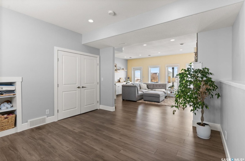 Living room featuring dark wood-type flooring