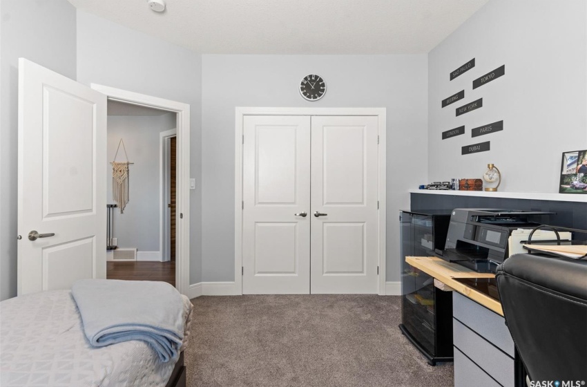 Bedroom featuring a closet and carpet flooring