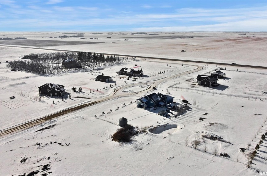 Snowy aerial view with a rural view