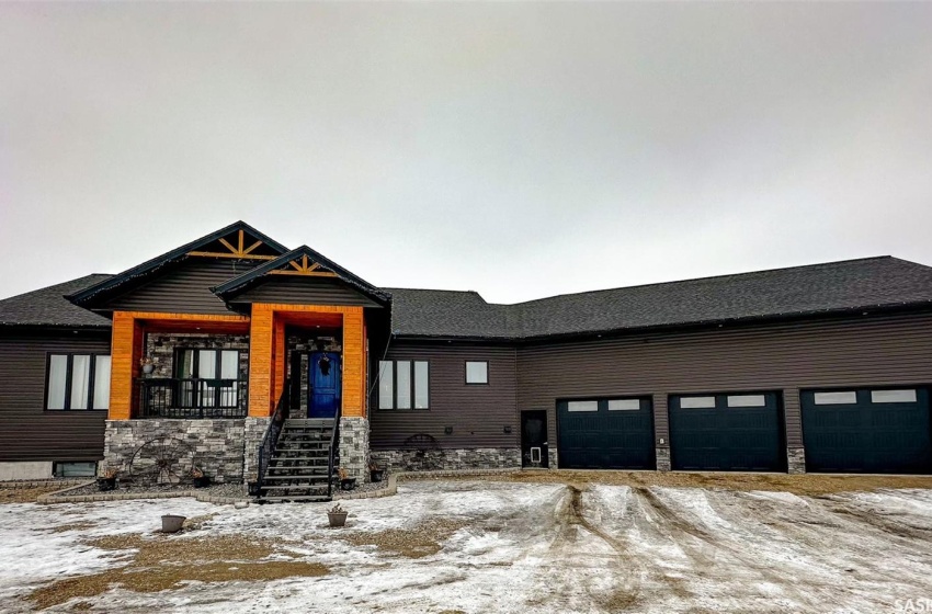 View of front facade featuring a garage