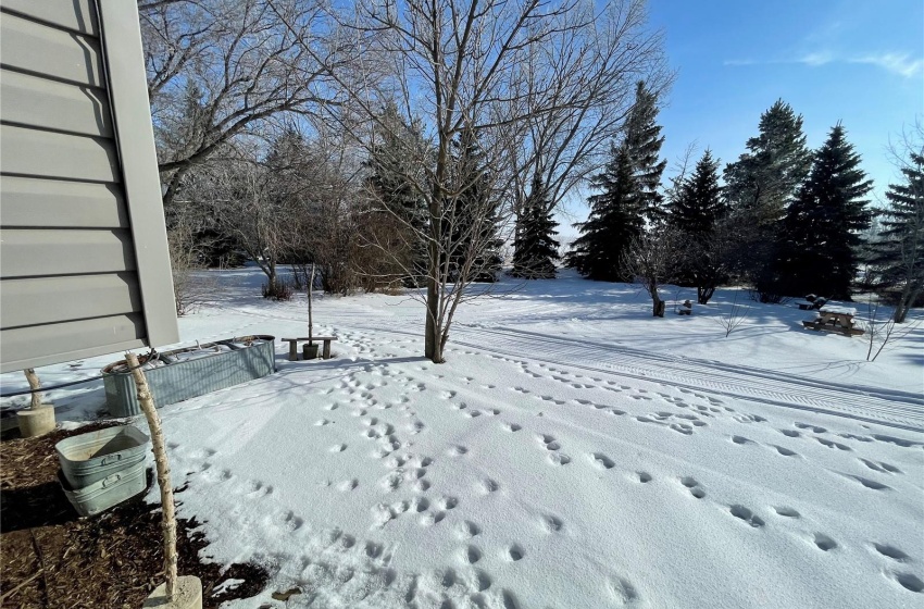 View of yard layered in snow