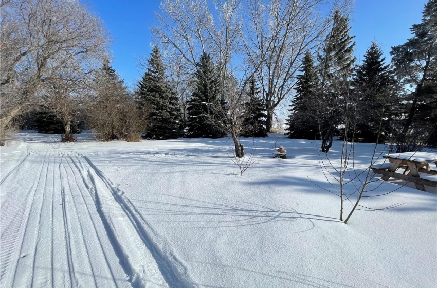 View of yard covered in snow