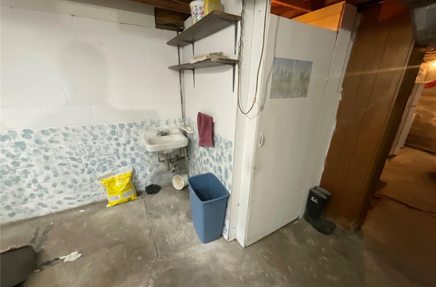 Basement featuring sink