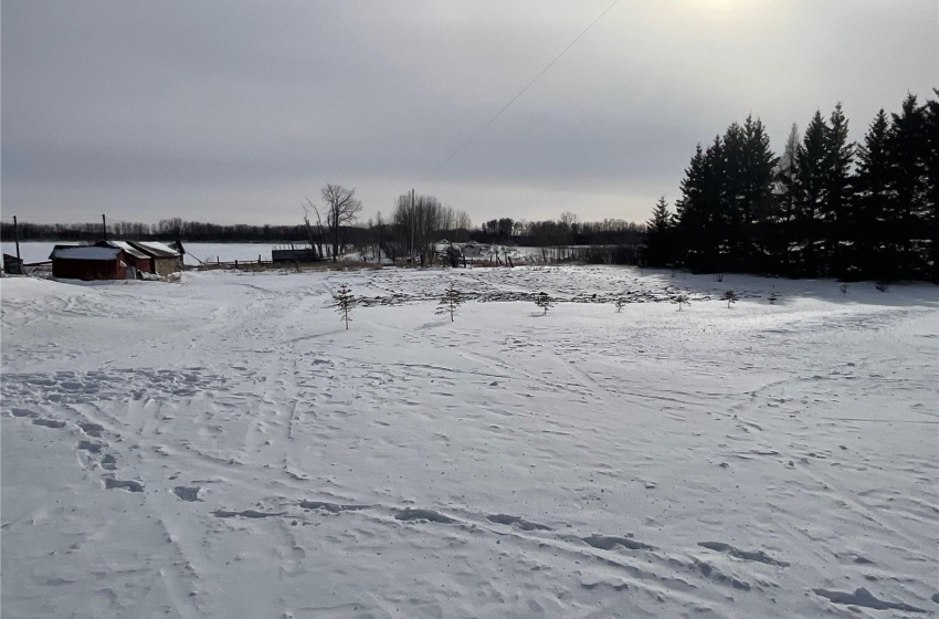 View of yard covered in snow