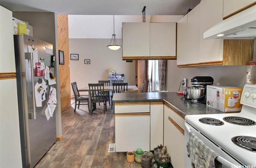 Kitchen with stainless steel fridge