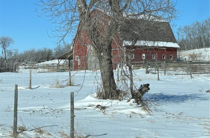 View of yard layered in snow