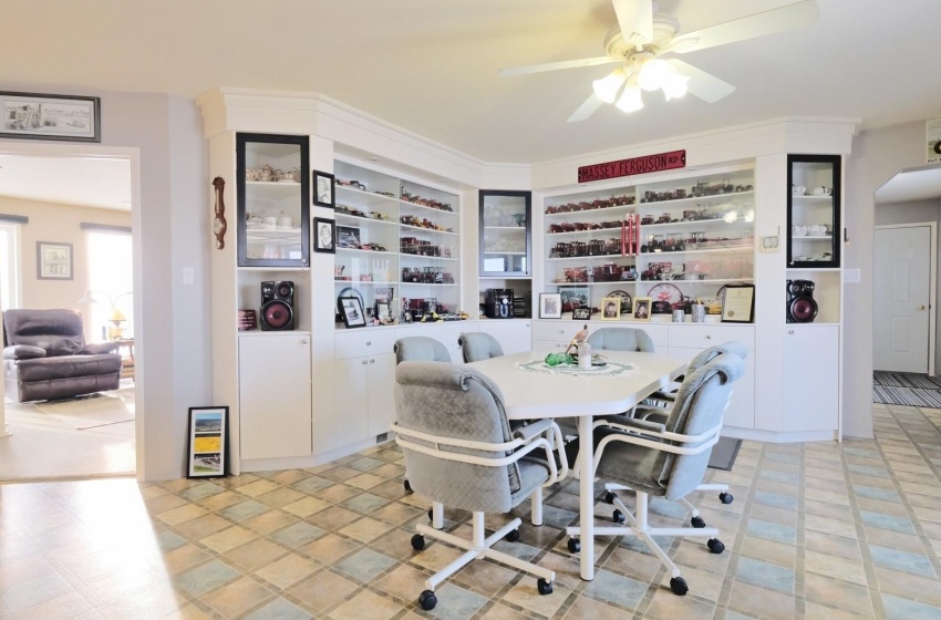 Tiled dining area with ceiling fan