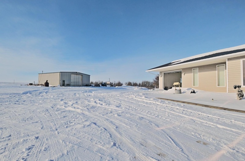 View of yard covered in snow