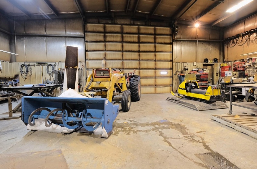 Garage featuring a workshop area