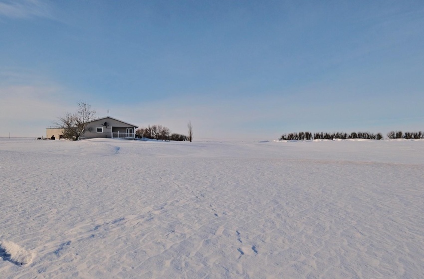 View of yard covered in snow