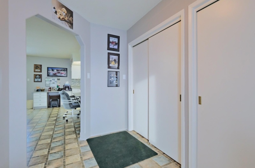 Entryway with light tile flooring