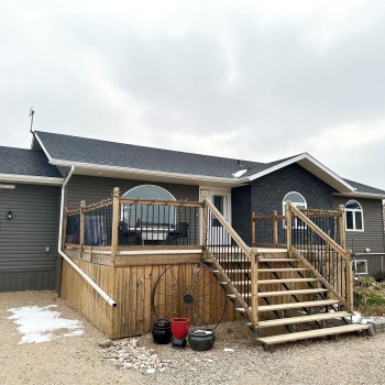 View of front of house featuring a deck