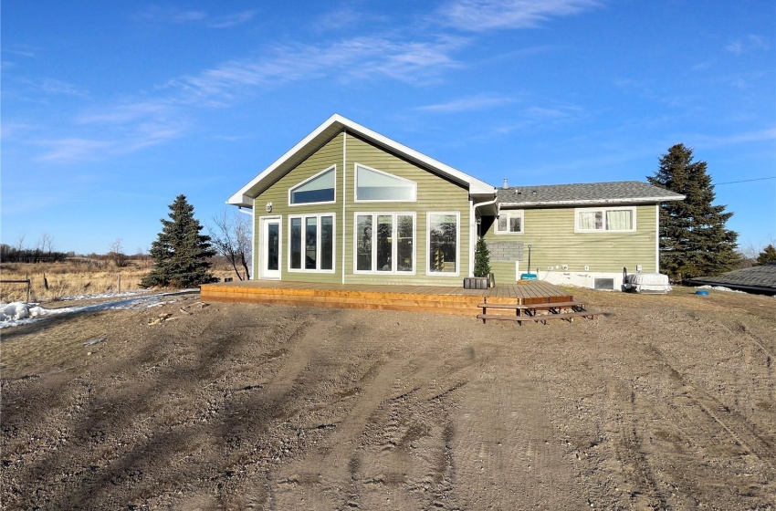 Rear view of house featuring a deck