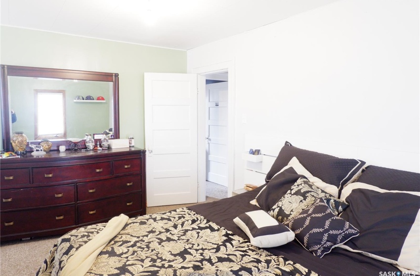 Bedroom with light carpet