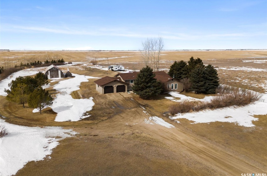 Snowy aerial view with a rural view