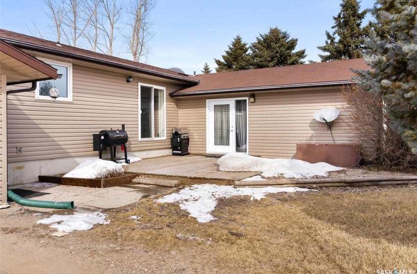 Rear view of property with a wooden deck