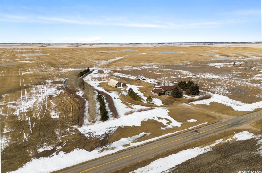 Snowy aerial view with a rural view