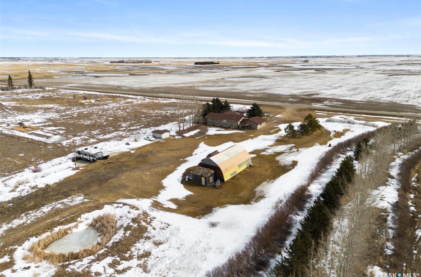 Snowy aerial view featuring a rural view