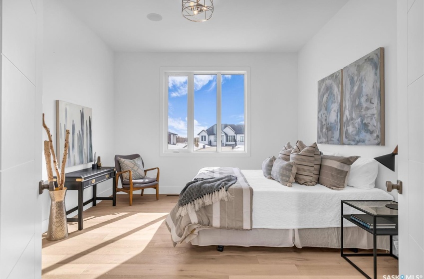 Primary Bedroom featuring light flooring and an abundance of natural light.