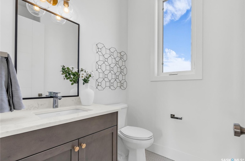 Bathroom featuring tile flooring, and vanity