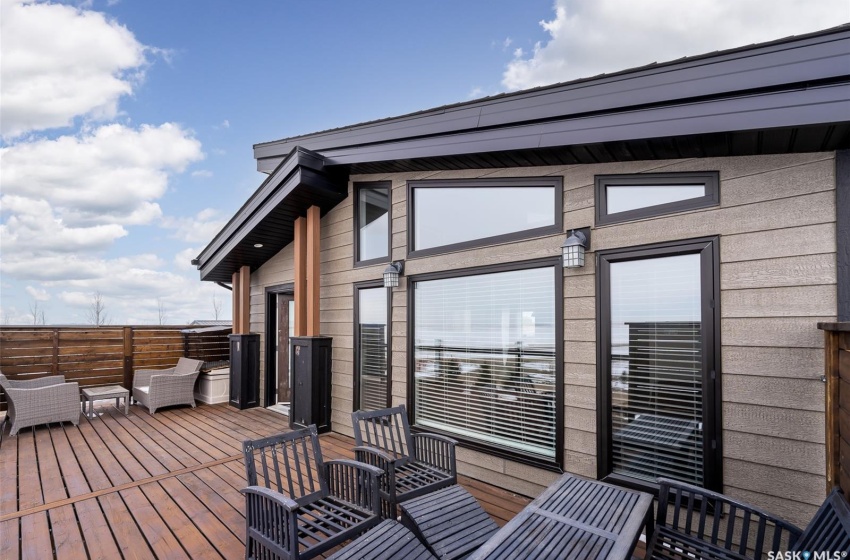 Wooden deck featuring outdoor lounge area