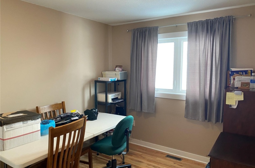 Home office featuring light wood-type flooring