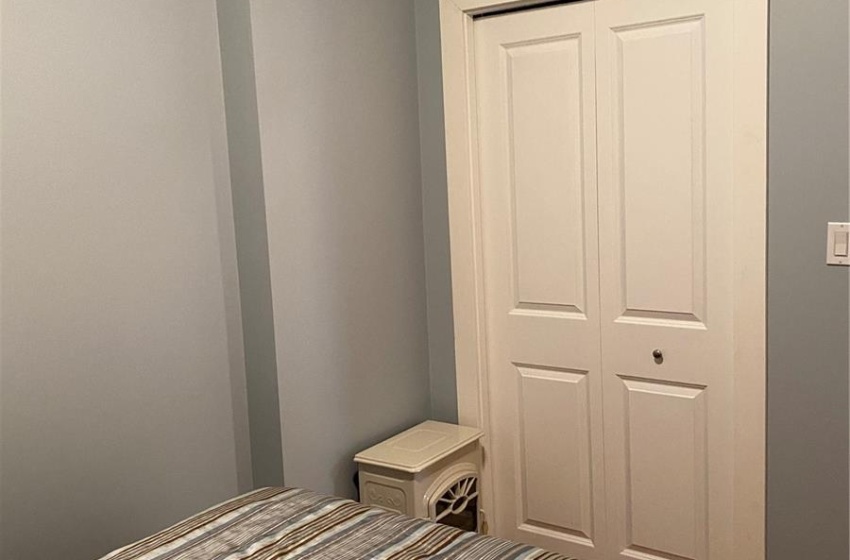 Unfurnished bedroom with a closet