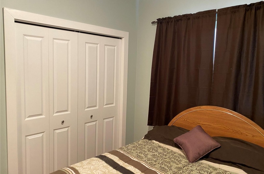 Bedroom featuring a closet