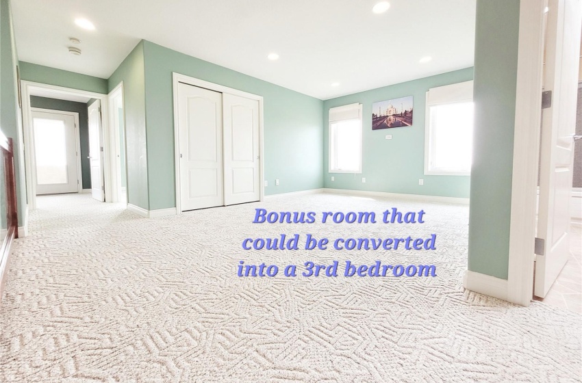 Carpeted bonus room that can be transformed into the third bedroom