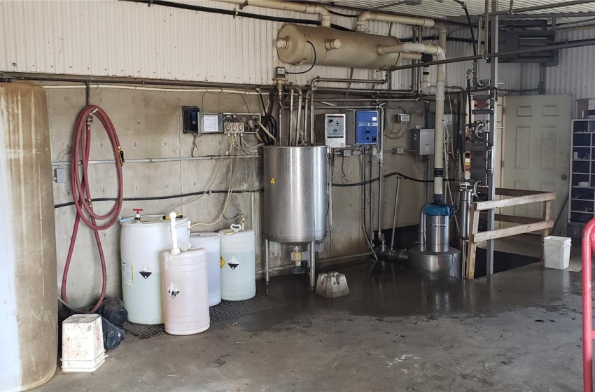 Utility room featuring water heater