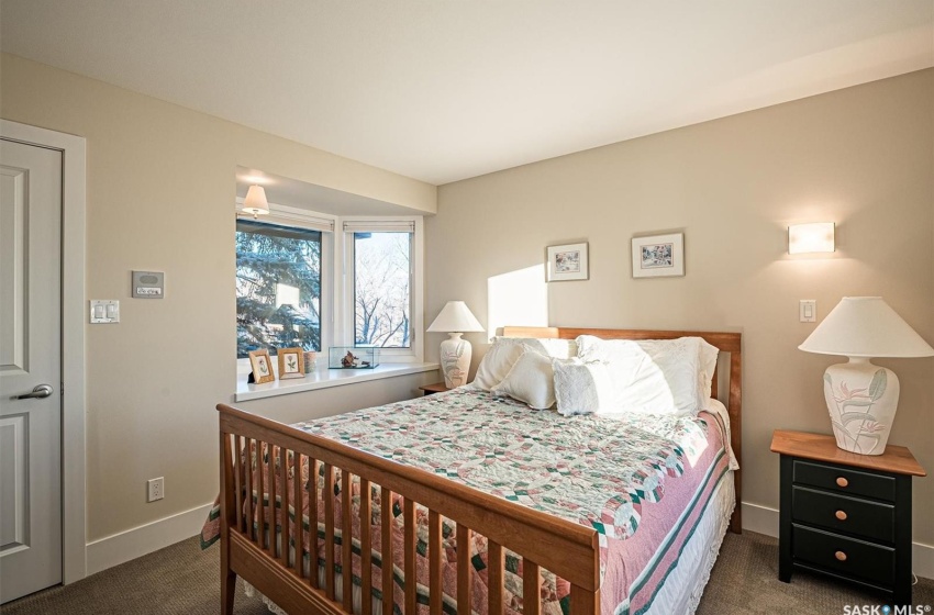 2nd storey carpeted bedroom