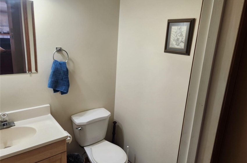 Bathroom with toilet and large vanity