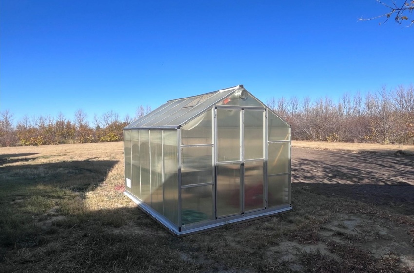 Green house near the garden patch