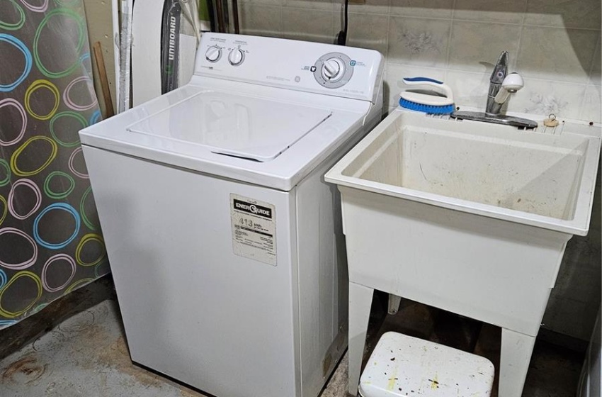 Washer and sink in Utility Room - Basement