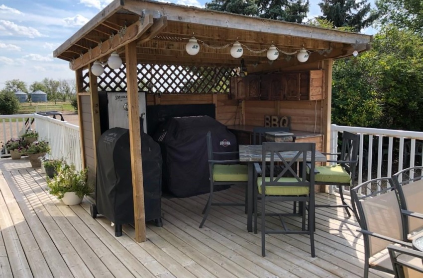 Deck featuring area for grilling