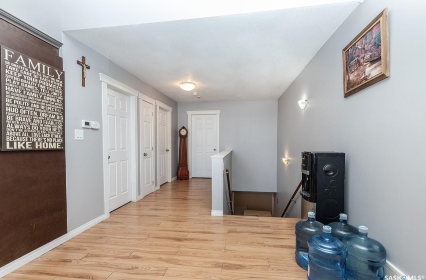 hallway to bedrooms bathroom and basement