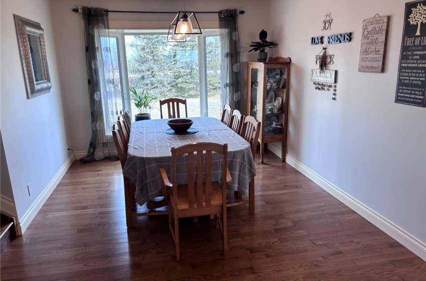 Dining area featuring aged oak hardwood  flooring