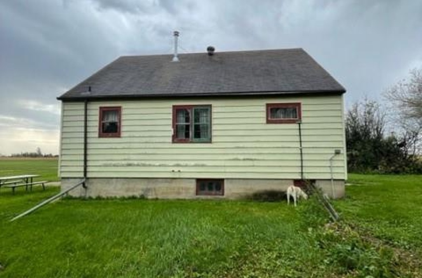 View of home's exterior with a lawn