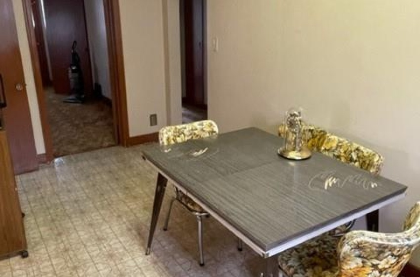 Dining area with light tile floors