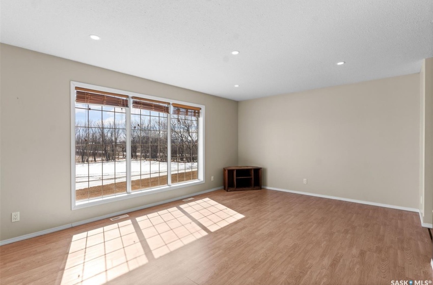 Empty room featuring light hardwood / wood-style flooring