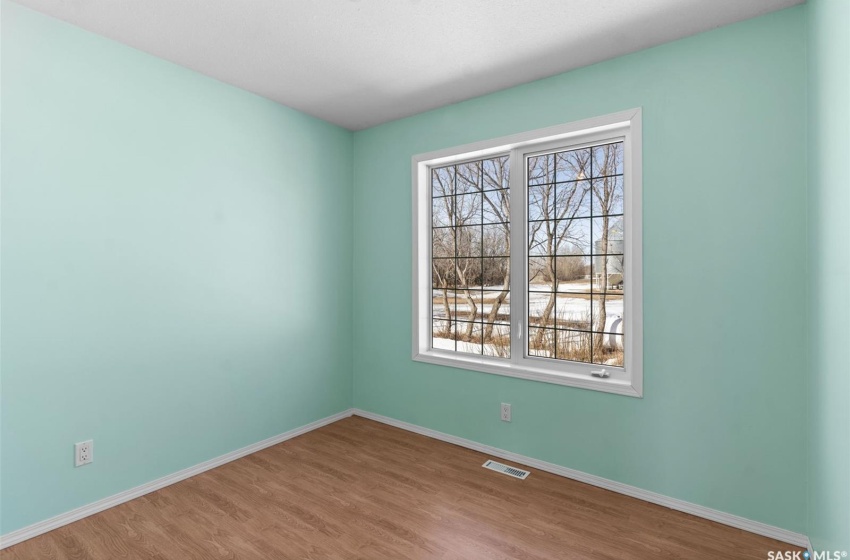 Spare room featuring hardwood / wood-style flooring