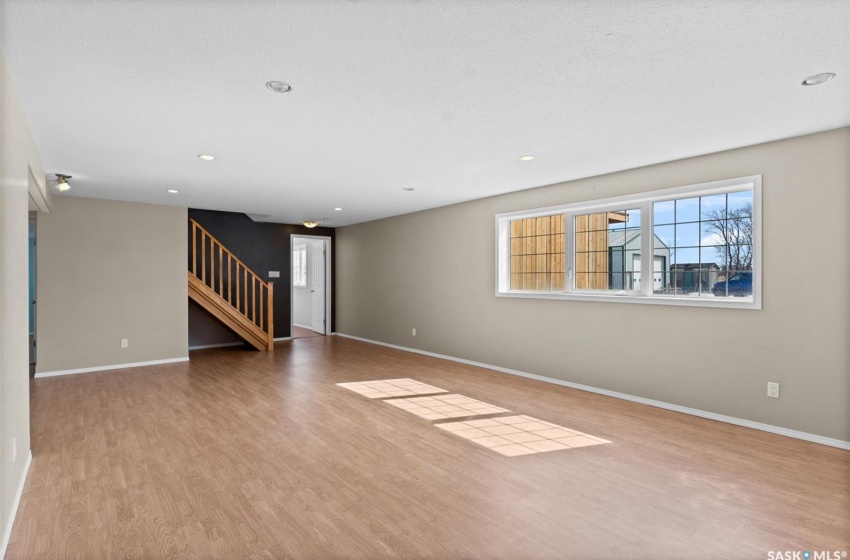 Unfurnished room featuring wood-type flooring