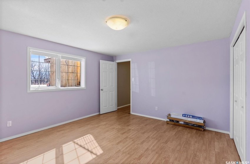 Unfurnished room featuring light wood-type flooring