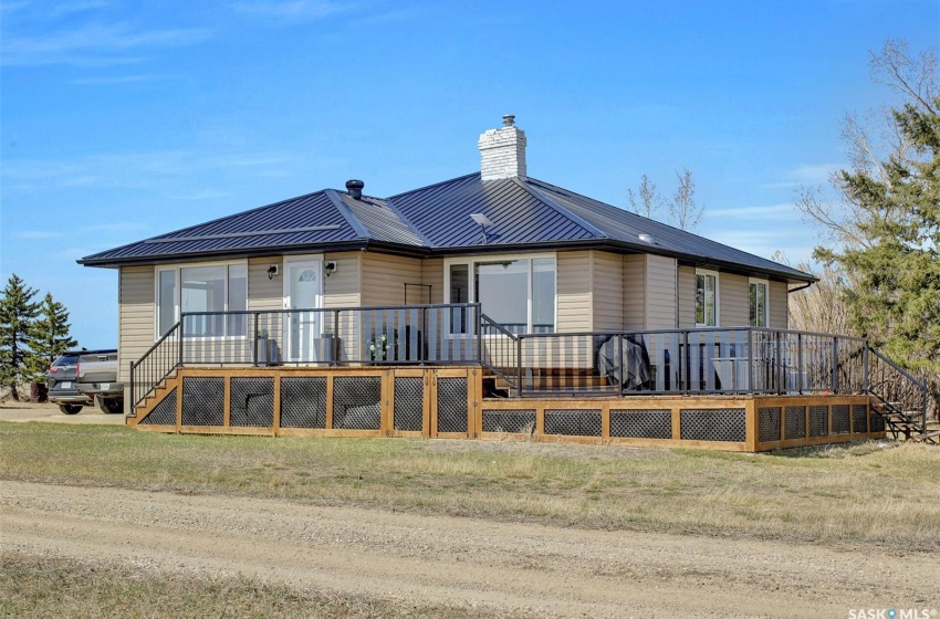 Rear view of property with a deck