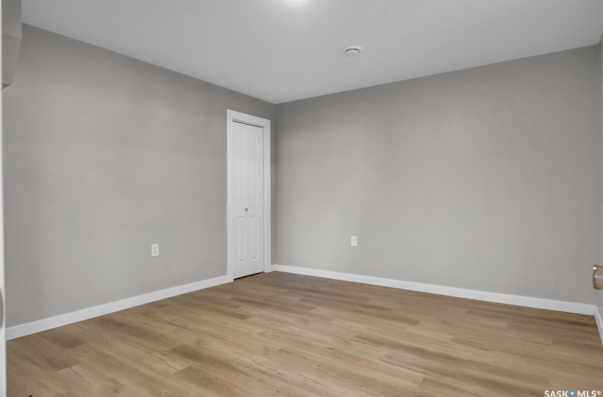 Spare room with light hardwood / wood-style floors