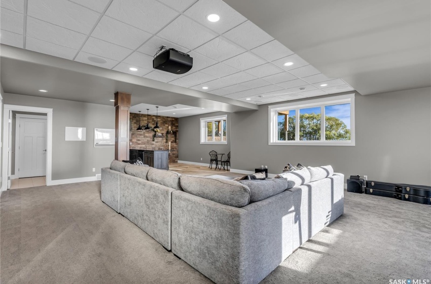 Basement Family Room. Projector and In-Ceiling Projector Screen