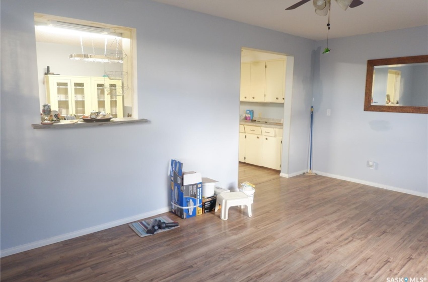 Unfurnished room featuring wood-type flooring and ceiling fan