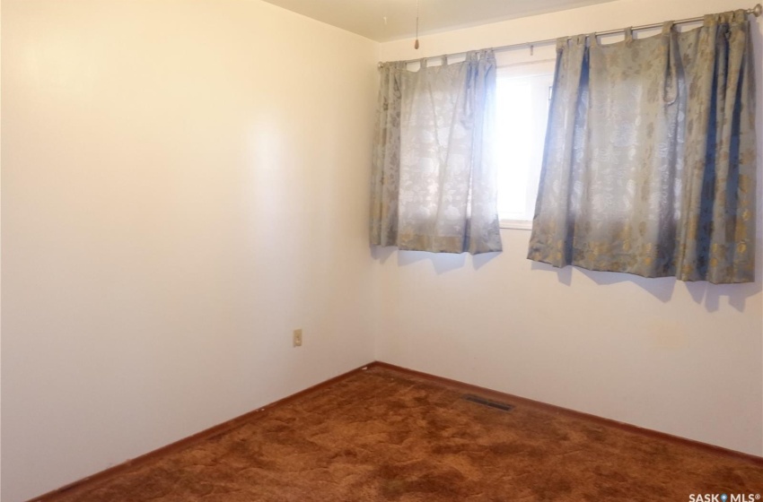 Empty room with carpet flooring