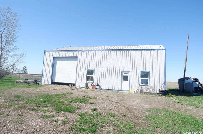 View of outdoor structure featuring a garage