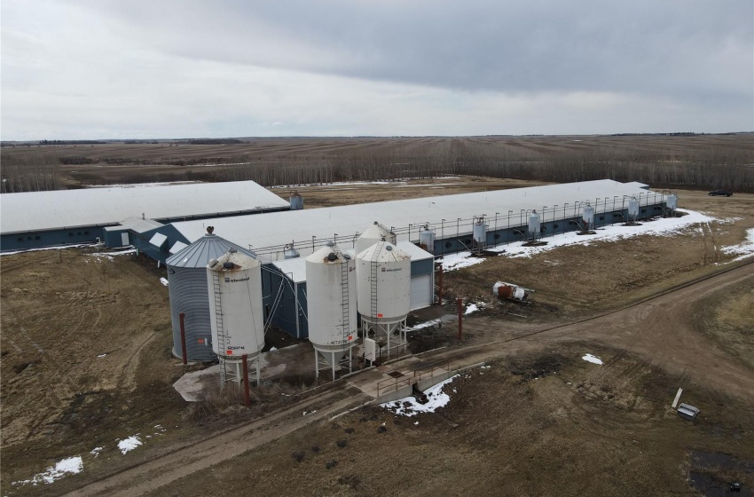 Birds eye view of property with a rural view